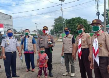 LDII Pringsewu Cegah Penyebaran Covid-19 dengan Bagikan Masker pada Warga