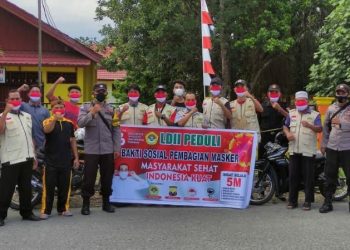 Sambut HUT RI ke-76, Babinkamtibmas Distrik Prafi dan LDII Bagikan Masker Gratis