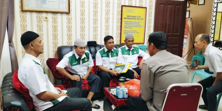 Pengurus PC LDII Kampar Kiri Tengah audiensi dengan Polsek Kampar Kiri Hilir, pada Sabtu (22/3). Foto: LINES.