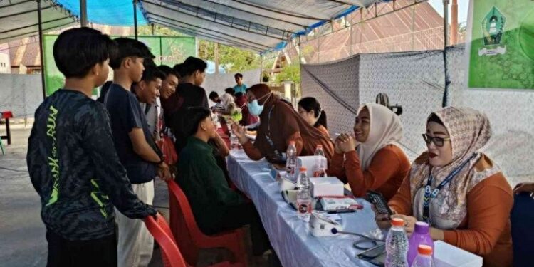 DPW LDII Sulawesi Tenggara (Sultra) menggelar cek kesehatan gratis di Lorong Al Mukhlis, Kecamatan Baruga, Kota Kendari. Foto: LINES.