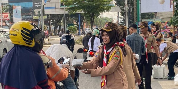 DPW LDII Sumatera Selatan (Sumsel) menghelat pembagian 1.500 paket takjil di kawasan Monumen Perjuangan Rakyat Palembang. Foto: LINES.