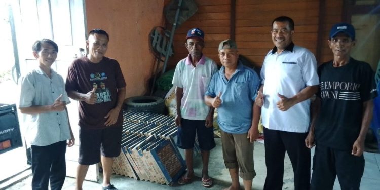 Dewan Pimpinan Daerah (DPD) Lembaga Dakwah Islam Indonesia (LDII) Kabupaten Bolaang Mongondow mendukung pembangunan infrastruktur desa melalui penyaluran bantuan material kepada masyarakat. Foto: LINES