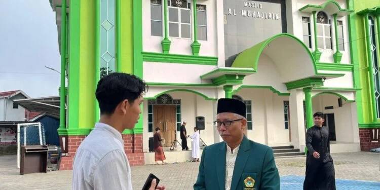 Ketua DPW LDII Kalimantan Selatan Dedi Supriatna saat diwawancara pada momen Idul Adha. Foto: LINES.